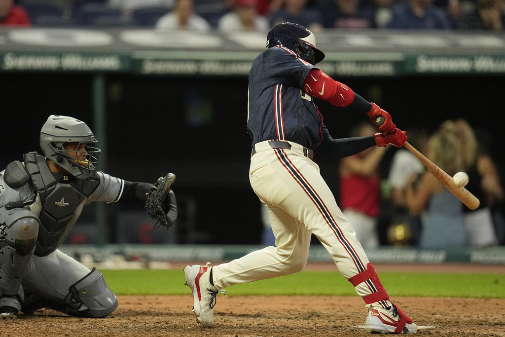 Bo Naylor of the Guardians hits a three-run home run as a pinch hitter to take the lead