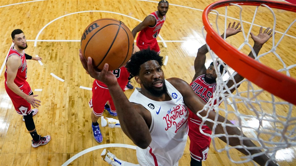 Brooks of Canada scores difficult and-one against Embiid