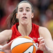 Caitlin Clark leads Fever to victory over Liberty with historic triple-double as WNBA rookie