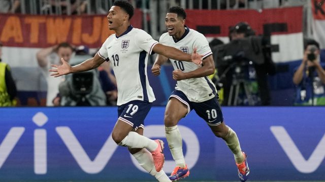 England soccer fans celebrate at The Killers concert in a special event