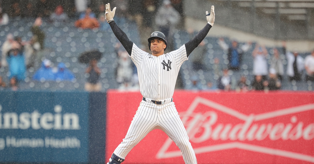 Soto of the Yankees hits a solo homer around the foul pole