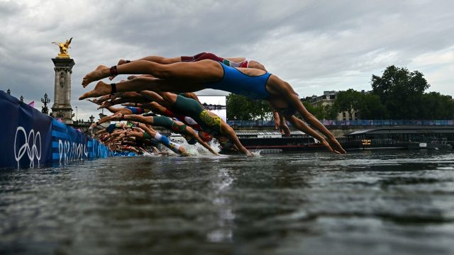 Belgian Athlete Falls Ill After Swimming in Seine, Leading Team to Withdraw from Triathlon Relay