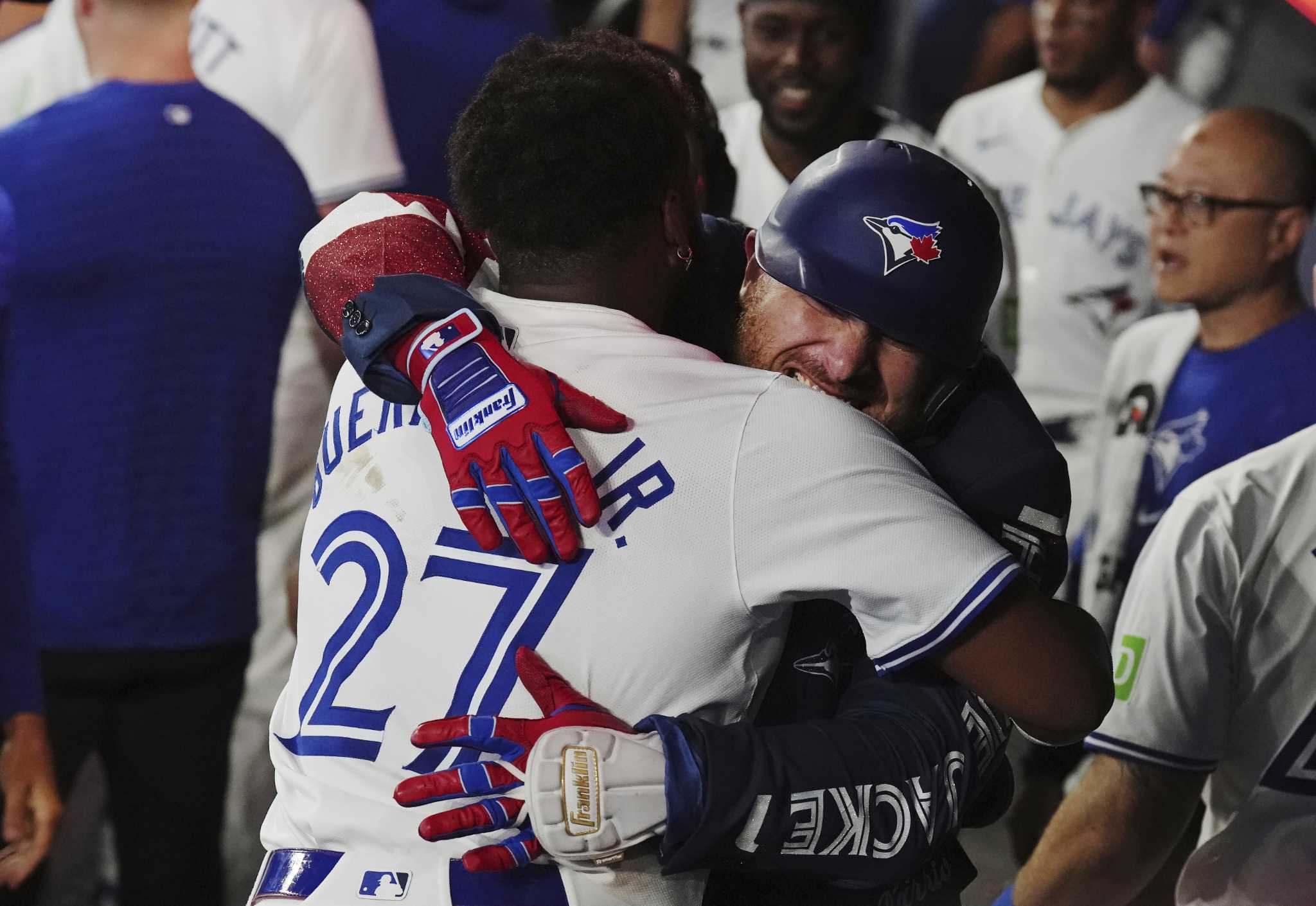 Kirk hits home run following intentional walk of Guerrero Jr. by Angels.