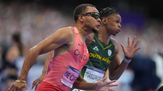 Noah Lyles earns bronze in men’s 200-m despite COVID-19 positive test