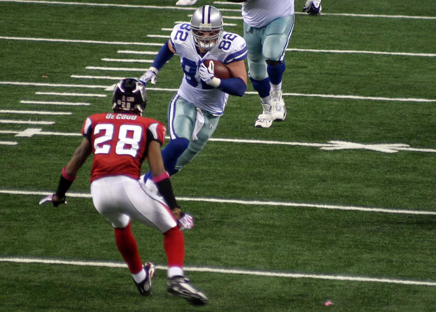 CeeDee Lamb of the Cowboys evades two defenders for a 65-yard touchdown