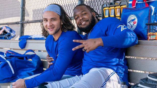 Schneider of the Blue Jays hits a two-RBI triple to deep centre field against the Mets